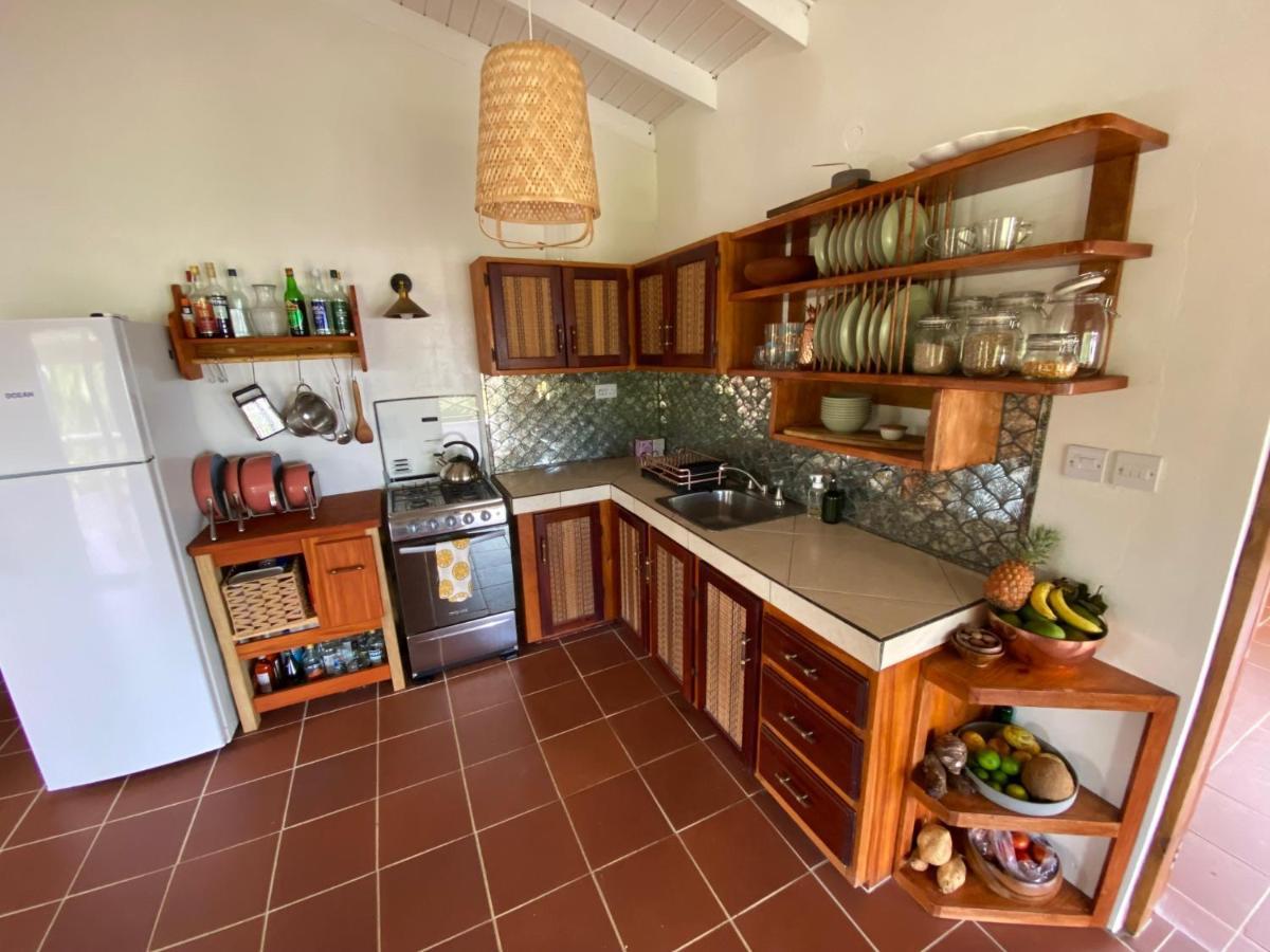 Sea Cliff Eco-Cottages & Gin Distillery Calibishie Екстериор снимка