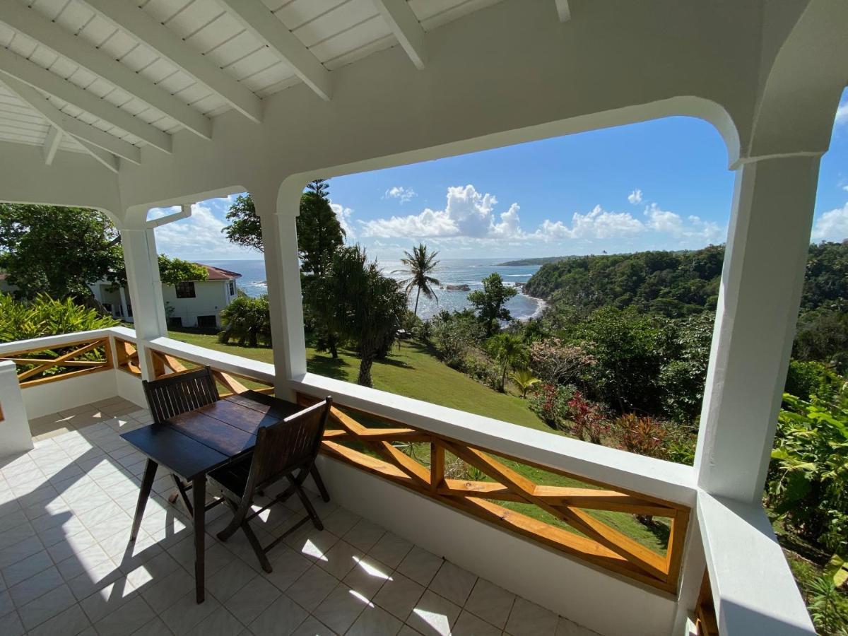 Sea Cliff Eco-Cottages & Gin Distillery Calibishie Екстериор снимка