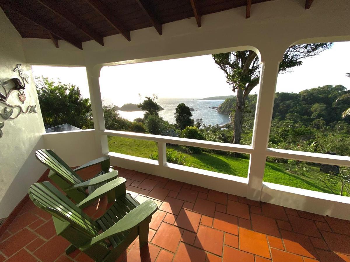 Sea Cliff Eco-Cottages & Gin Distillery Calibishie Екстериор снимка
